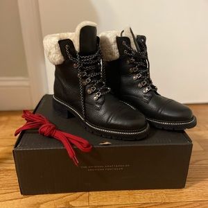 Chic combat boots. Never worn.